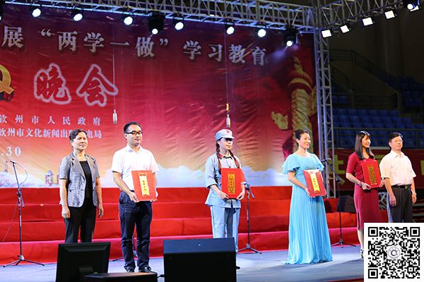 我校合唱团参加钦州市庆祝建党95周年暨“两学一做”学习教育歌咏晚会